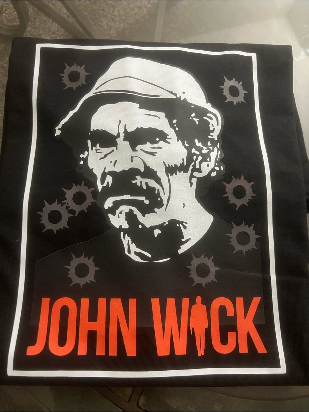 Urban Outfitters Black John Wick Graphic Tee with White Print and Orange Text